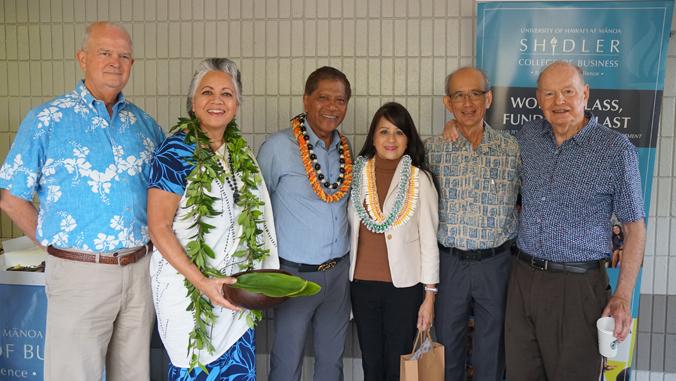 “From left, Vance Roley, Kahu Lāhela, Roland and Evelyn Casamina, Shidler advisory board member Robin Campaniano, and Former Shidler Dean Dave Heenan”