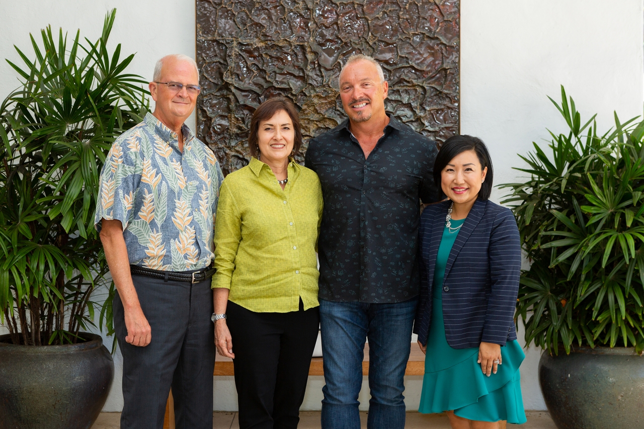 From left: Vance Roley, dean, Shidler College of Business; Jo Anne and Keith Vieira; and Unyong Nakata, executive director of development.